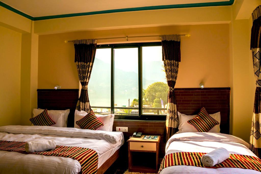 Hotel Adam Pokhara Quarto foto